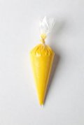 Yellow royal icing bag