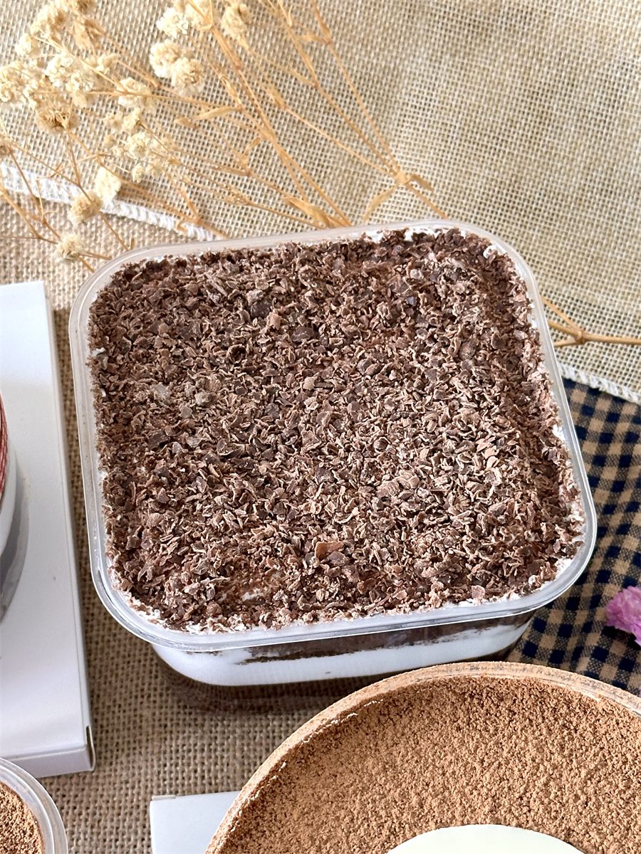 Black Forest dessert box topped with chocolate shavings