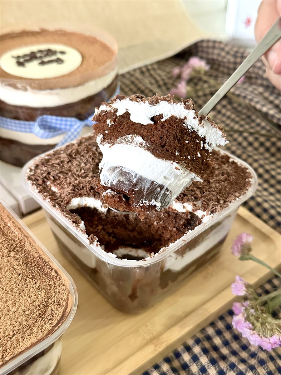 Black Forest dessert box — chocolate layers on a spoon