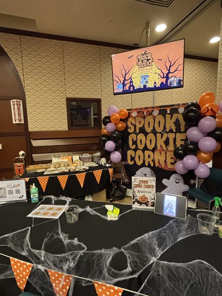 The Spooky Cookie Corner by Sugarcoat — a decorated event booth